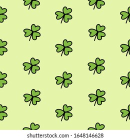 Hand drawn seamless pattern Saint Patrick's Day traditional symbol green  clover vector illustration isolated on light green background.Design  best for wrapping, textile, wallpaper, greeting paper