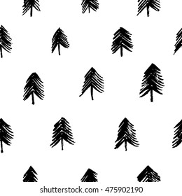 Hand drawn seamless pattern with silhouettes of  trees. Ink illustration. Hand drawn nature pattern. Christmas ornament. 