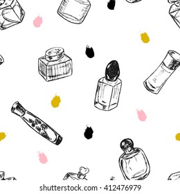 Hand drawn seamless pattern with sketched bottles of perfume and colorful ink strokes. Beauty and fashion seamless background. Design template for wrapping, fashion, textile etc.