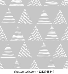 Hand drawn seamless pattern with striped triangles