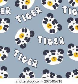 Hand drawn seamless pattern with tiger faces and text TIGER. Perfect for T-shirt, textile and print. Cartoon style vector illustration for decor and design.

