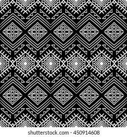 Hand drawn seamless pattern with tribal aztec ornament. Ethnic stylized print template for fabric and paper. Black and white. Summer fashion. Boho chic design.