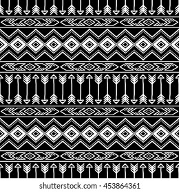Hand drawn seamless pattern with tribal aztec ornament. Ethnic stylized print template for fabric and paper. Black and white. Summer fashion. Boho chic design.