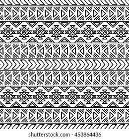 Hand drawn seamless pattern with tribal aztec ornament. Ethnic stylized print template for fabric and paper. Black and white. Summer fashion. Boho chic design.