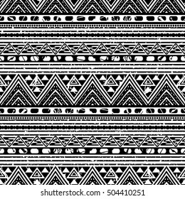 Hand drawn seamless pattern with tribal aztec motives. Black and white abstract wallpaper in boho style.