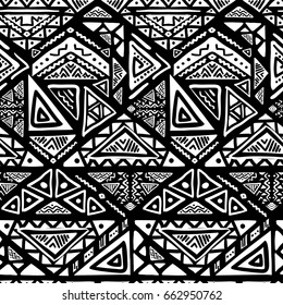 Hand drawn seamless pattern with tribal aztec motives. Black and white abstract wallpaper in boho style.