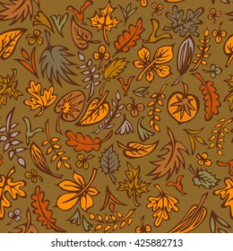 Hand drawn seamless  pattern with a variety of autumn orange leaves.  Endless floral background