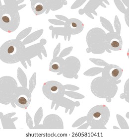 Hand drawn seamless pattern with various crayons bunnies.