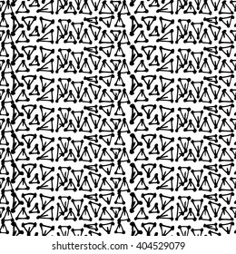 Hand drawn seamless pattern, vector texture for handmade design. Black mono color triangles art.