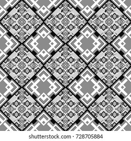 Hand drawn seamless pattern. Vector tribal design in white, gray and black colors. Zigzag and stripe line, rhombus and tiles. Ethnic theme. For textile, wallpaper, wrapping paper.