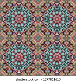 Hand drawn seamless pattern. Vintage decorative elements. Abstract colorful mosaic style. Indian, Arabic, Turkish motifs. Vector patchwork quilt pattern in gray, pink and blue colors.