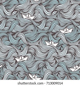 Hand drawn seamless pattern with waves and cute little paper boats