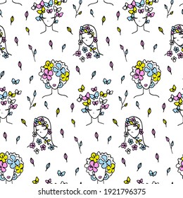 Hand drawn seamless pattern with women faces of different nationalities. Vector illustration. Spring collection