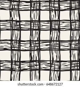 Hand drawn seamless plaid pattern. Allover pattern with ink doodle grunge grid. Graphic background with freehand line tartan.
