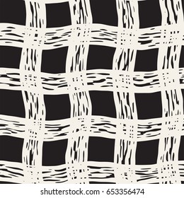 Hand drawn seamless plaid pattern. Allover pattern with ink doodle grunge grid. Graphic background with freehand line tartan.