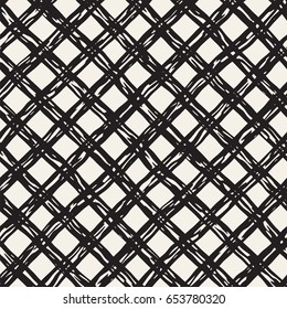 Hand drawn seamless plaid pattern. Allover pattern with ink doodle grunge grid. Graphic background with freehand line tartan.