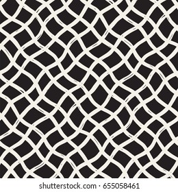 Hand drawn seamless plaid pattern. Allover pattern with ink doodle grunge grid. Graphic background with freehand line tartan.