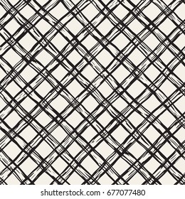 Hand drawn seamless plaid pattern. Allover pattern with ink doodle grunge grid. Graphic background with freehand line tartan.