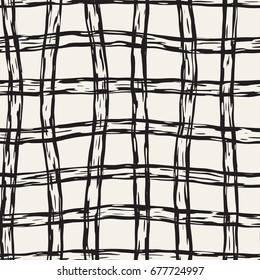 Hand drawn seamless plaid pattern. Allover pattern with ink doodle grunge grid. Graphic background with freehand line tartan.