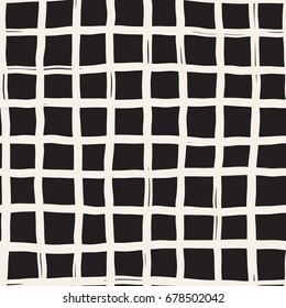 Hand drawn seamless plaid pattern. Allover pattern with ink doodle grunge grid. Graphic background with freehand line tartan.