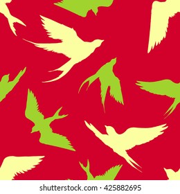 Hand drawn seamless red pattern with silhouettes of  flying swallows.