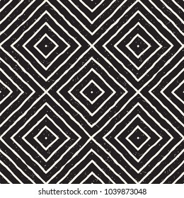 Hand drawn seamless repeating pattern with lines tiling. Grungy freehand ink brush background texture.