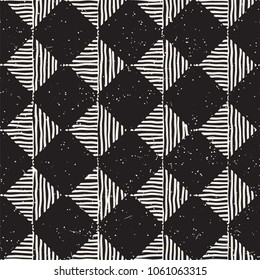Hand drawn seamless repeating pattern with checker lines tiling. Grungy freehand ink brush background texture.