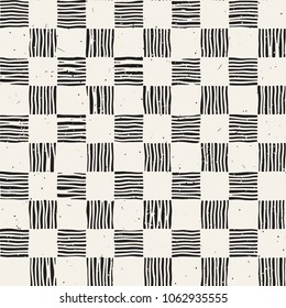 Hand drawn seamless repeating pattern with checker lines tiling. Grungy freehand ink brush background texture.