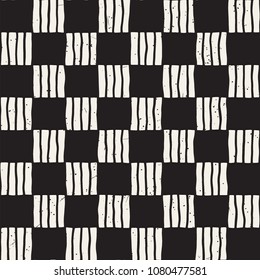 Hand drawn seamless repeating pattern with checker lines tiling. Grungy freehand ink brush background texture.