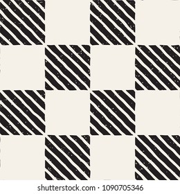 Hand drawn seamless repeating pattern with checker lines tiling. Grungy freehand ink brush background texture.