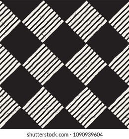 Hand drawn seamless repeating pattern with checker lines tiling. Grungy freehand ink brush background texture.