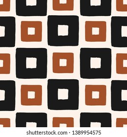 Hand drawn seamless repeating pattern with square shapes in black and brown on cream background. Bold geometric shapes fabric, wallpaper, stationery, packaging design.