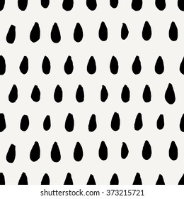 Hand Drawn Seamless Repeating Pattern With Raindrop Shapes In Black And Cream.