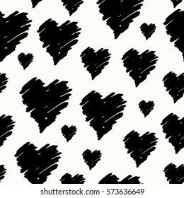Hand drawn seamless repeating pattern with hearts in black and cream. Modern and stylish romantic design poster, wrapping paper, Valentine card design.