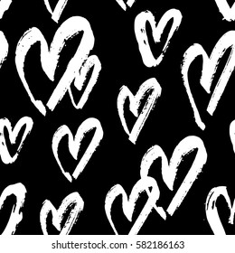 Hand drawn seamless repeating pattern with hearts in black and white. Modern and stylish romantic design poster, wrapping paper, Valentine card design.