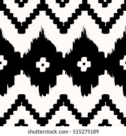 Hand drawn seamless tribal pattern in black and cream. Modern textile, wall art, wrapping paper, wallpaper design.