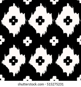 Hand drawn seamless tribal pattern in black and cream. Modern textile, wall art, wrapping paper, wallpaper design.