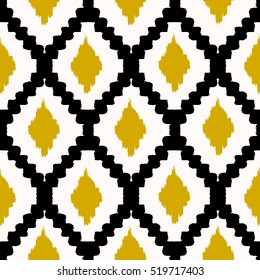 Hand drawn seamless tribal pattern in black, yellow and cream. Modern textile, wall art, wrapping paper, wallpaper design.