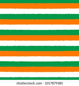 Hand drawn seamless vector pattern with white, orange and green stripes. Design concept for Saint Patrick's day celebration, kids textile print, wallpaper, wrapping paper.