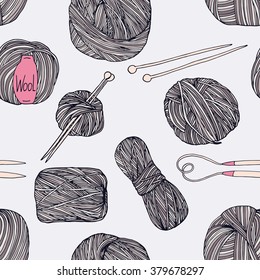 The hand drawn seamless vector pattern of knitting elements. Yarns and needles.