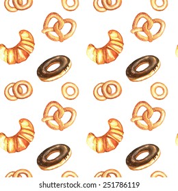 Hand drawn seamless watercolor pattern with isolated tasty donuts, bagels, pretzels and croissant on the white background.