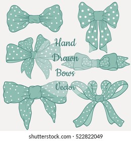 Hand drawn set of beautiful tender bows with polka dots. Ideal for your own design. Isolated vector illustration