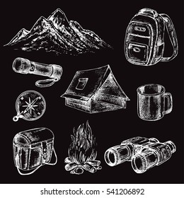 hand drawn set camping items on the black background
