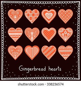 Hand drawn set of christmas gingerbread hearts with doodle ornament. Vector.
