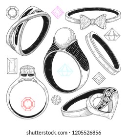 Hand drawn a set of different jewelry rings. Vector illustration of a sketch style.