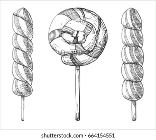 Hand drawn set of different lollipops. Vector illustration of a sketch style.