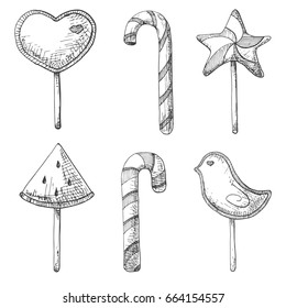 Hand drawn set of different lollipops. Vector illustration of a sketch style.