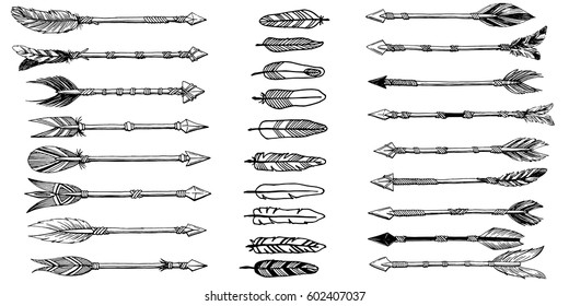 Hand drawn set of ethnic arrows anf feathers isolated on white background. Vector illustration with tribal elements for design
