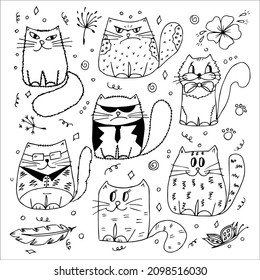 Hand drawn set of funny cats  in the style of doodles, black and white