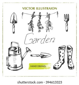 Hand drawn set of garden accessories: rubber boots, shovel, watering can and herbs. Vector illustration.